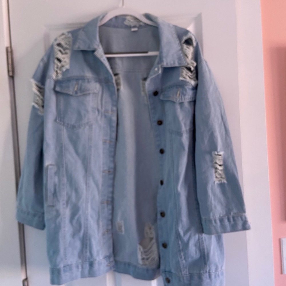 Ripped denim jacket